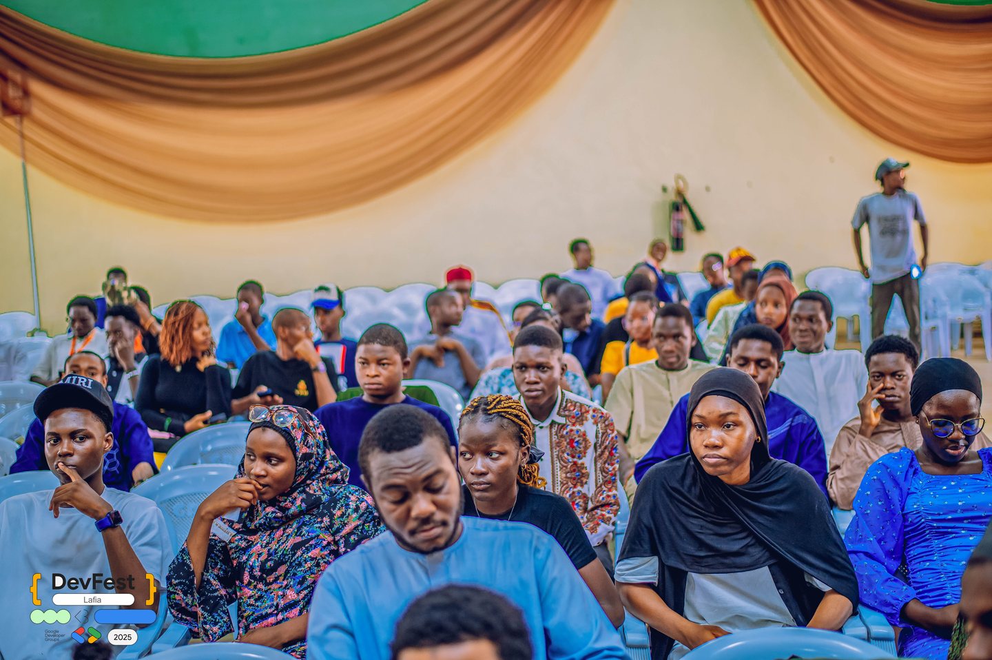 Participants engaging in conference sessions
